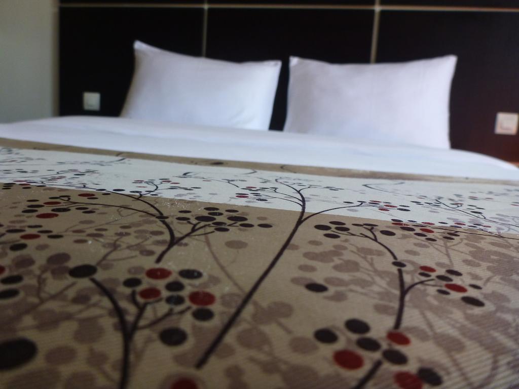 Detente Hotel أبيدجان الغرفة الصورة